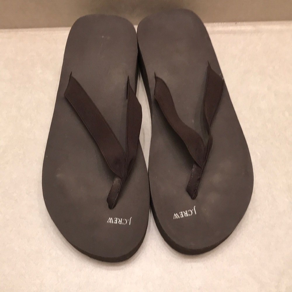 Brown wedged flip flops